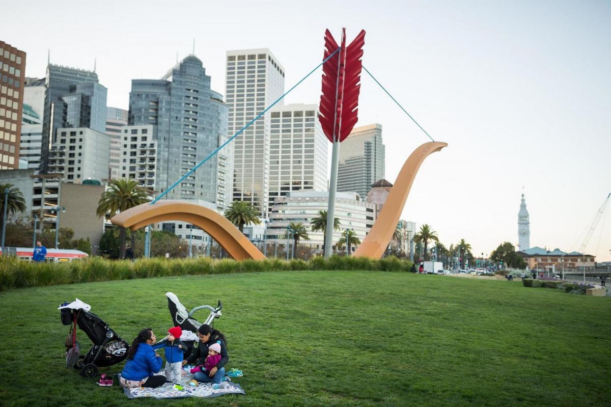 People sitting on the lawn at Rincon Park