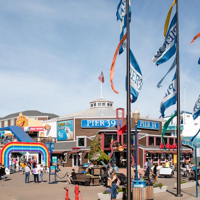 Flags flying at the entrance of Pier 39