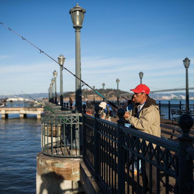 Man fishing at Pier 7