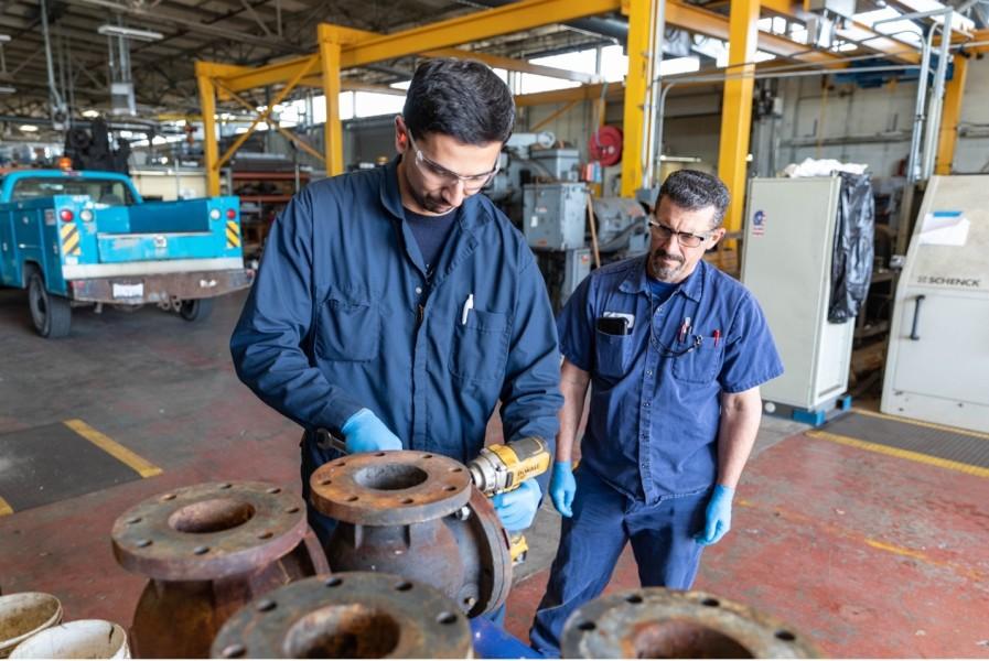 Staff closely supervise pre-apprentices during hands-on training in the program.