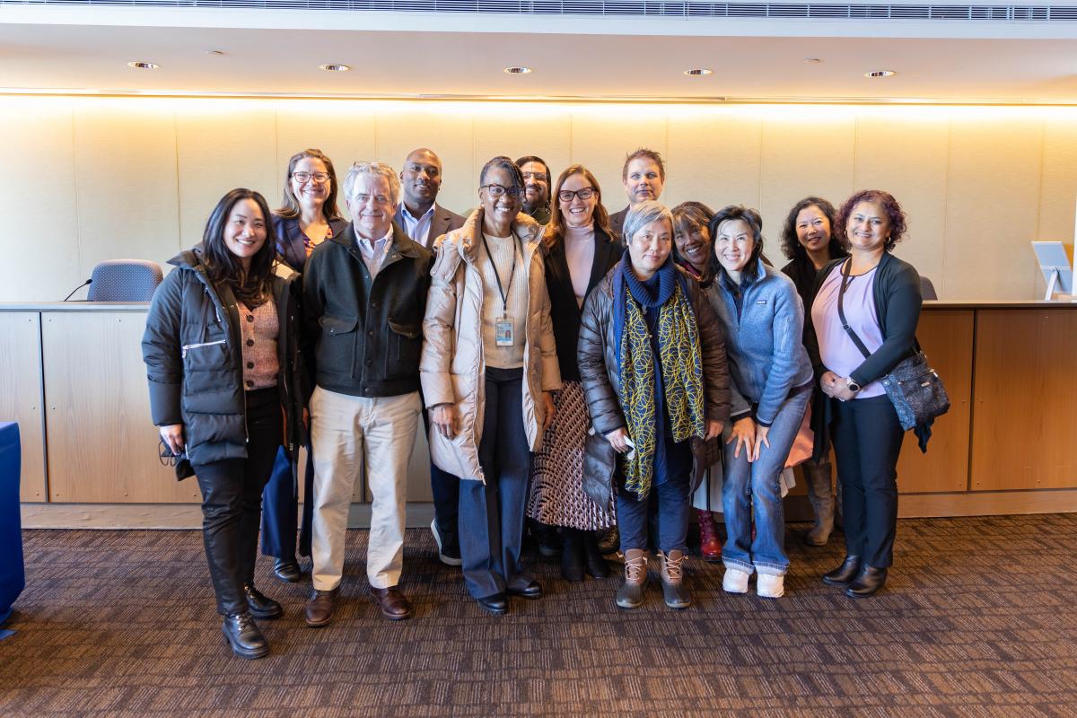 A group of Port employees gather to take a photo at an annual event.