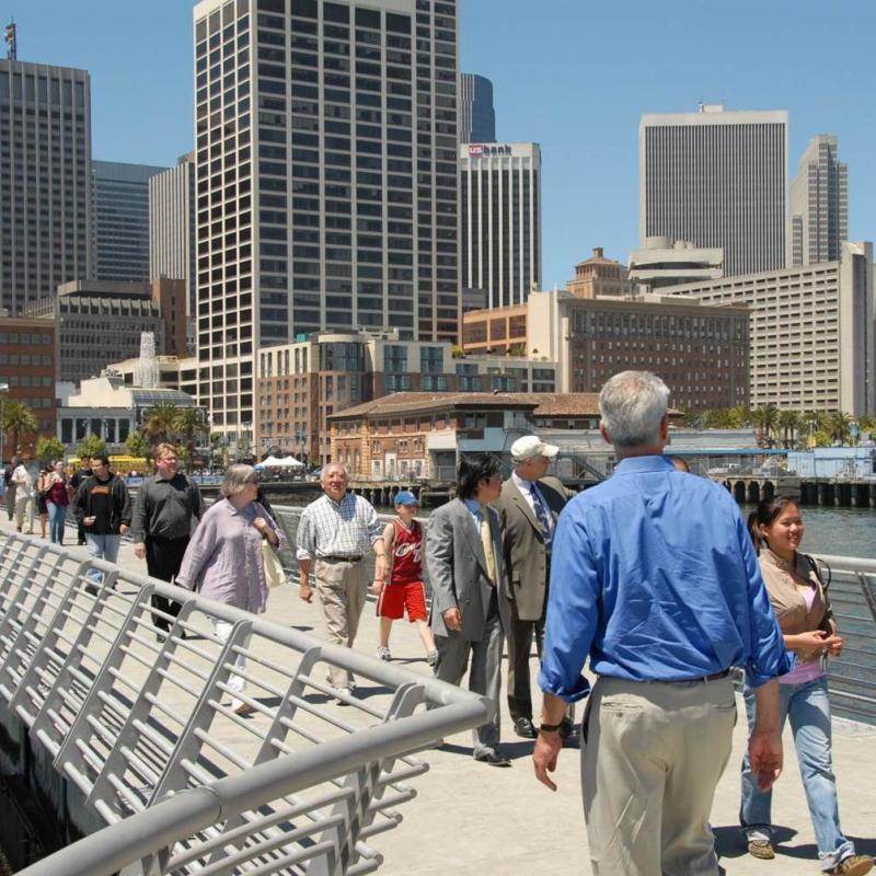 People walking on Pier 14